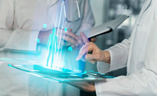 medicos 2, com tablet e uma imagem em 3D saindo do tablet